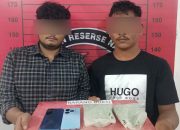 Dua pria yang diduga merupakan pengedar narkotika jenis pil ekstasi bersama barang bukti diamankan di Mapolres Aceh Utara, Lhoksukon.