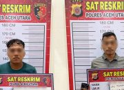 Terduga pelaku judol beserta barang bukti berupa telepon genggam, diamankan di Mapolres Aceh Utara, Lhoksukon