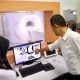 Sekda Aceh, M. Nasir, memeriksa hasil pemindaian dari alat MRI 1,5 Tesla usai prosesi serah terima di Gedung Onkologi RSUDZA, Banda Aceh, Rabu (8/10/2025).