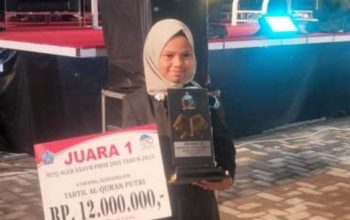 Nailul Arifa, siswi MIN 6 Aceh Utara, tampil gemilang di MTQ ke-37 Aceh dan meraih Juara Satu Tartil Putri.