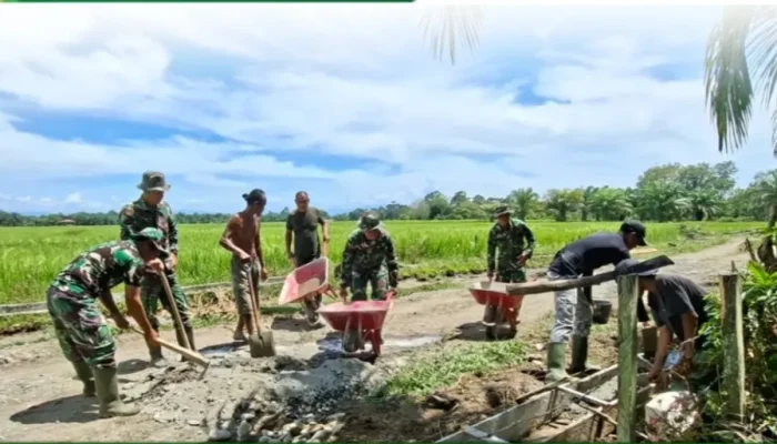Terik Membara, Satgas TMMD Tuntaskan Talud Desa