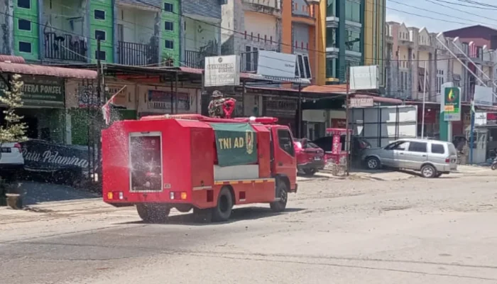 Kodim Pidie Turun Tangan Atasi Debu Parah Jalur Meureudu